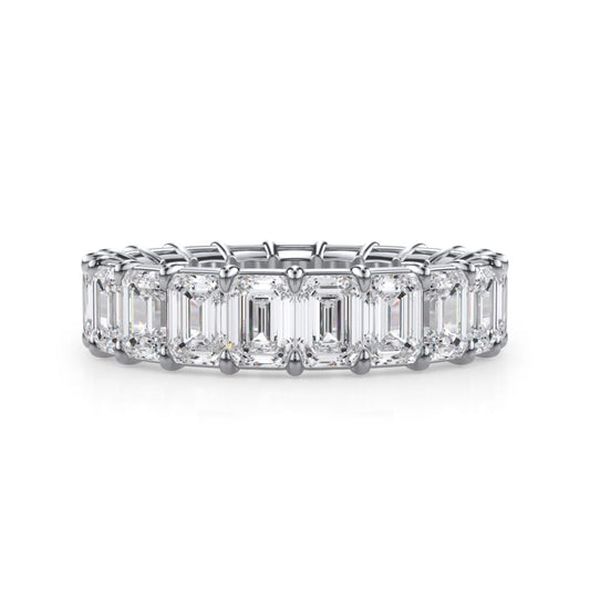 Emerald-cut diamond eternity band in white gold.