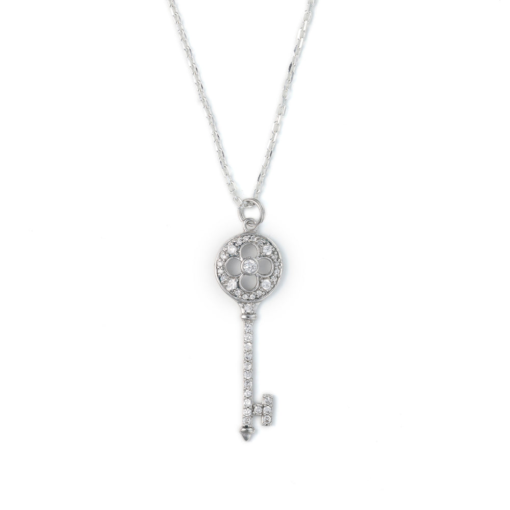Sterling silver key pendant with cubic zirconia.