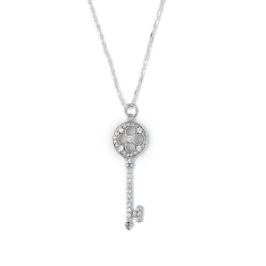 Sterling silver key pendant with cubic zirconia.