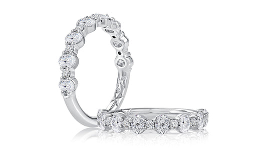 Oval and round diamond white gold wedding band.