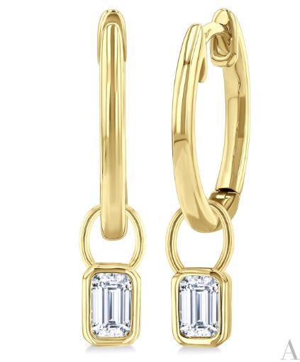 14K yellow gold hoops with emerald diamonds.