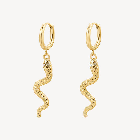 Gold snake dangle earrings with simulated diamonds.