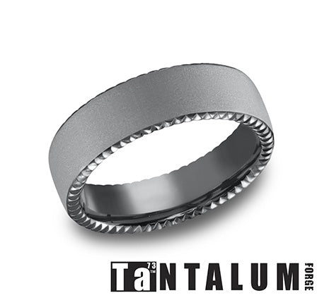Dark grey tantalum carved men's band.