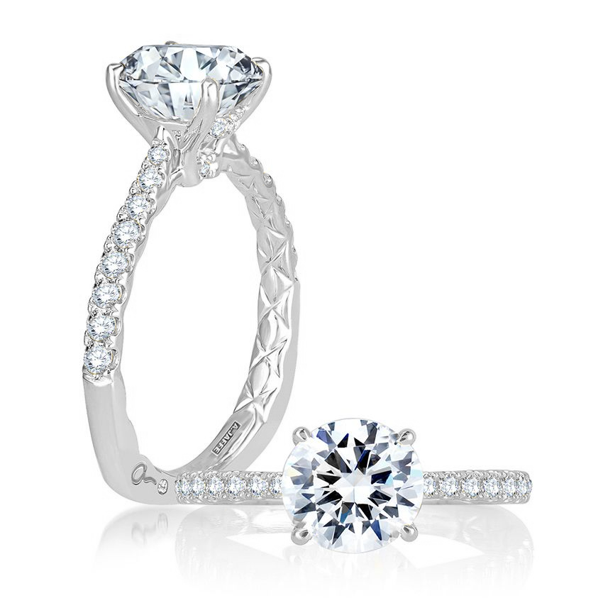 White gold ring with diamond accents.