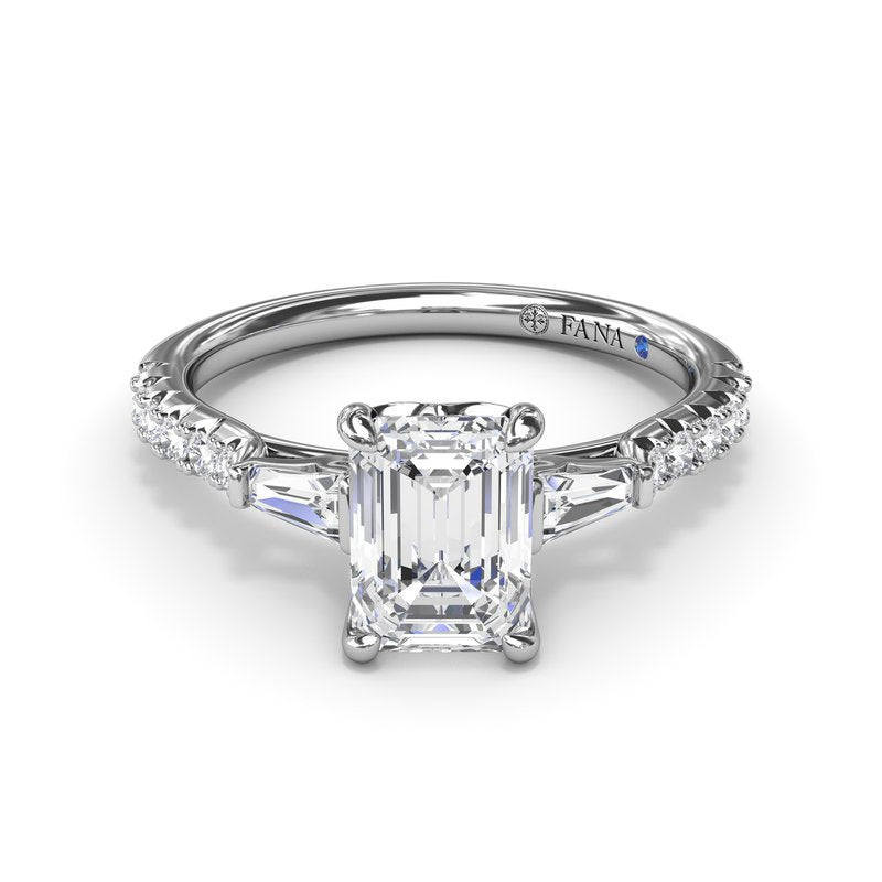 Three-stone diamond ring in white gold.