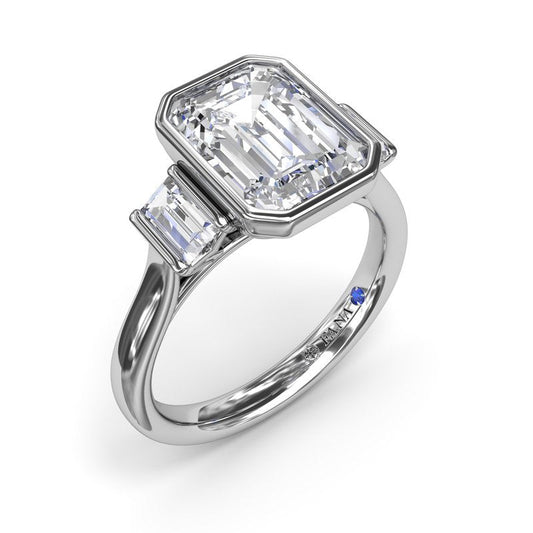 Emerald-cut diamond ring with side stones.