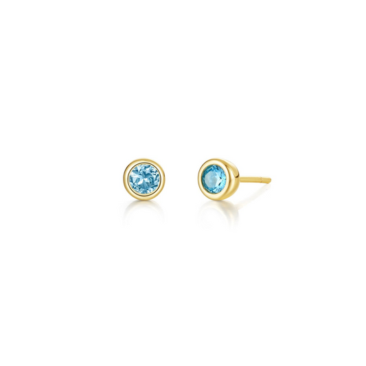 Yellow sterling silver earrings with blue topazes.