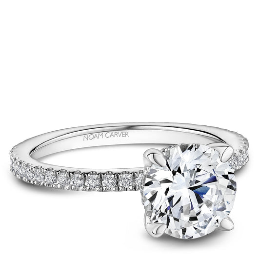 White gold ring with round diamond accents.