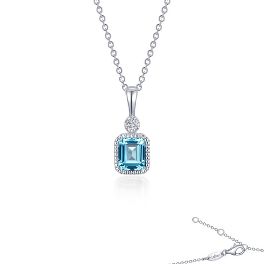 Emerald-cut aquamarine pendant with diamond accent.