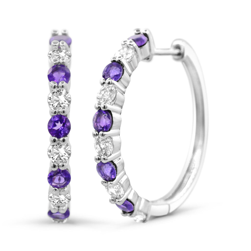 Sterling silver hoops with purple amethysts.