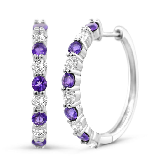 Sterling silver hoops with purple amethysts.