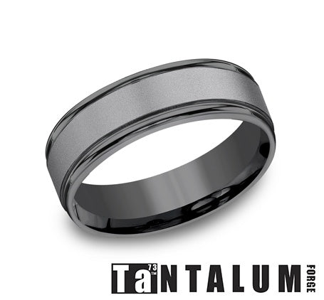 Light grey tantalum men's carved band.