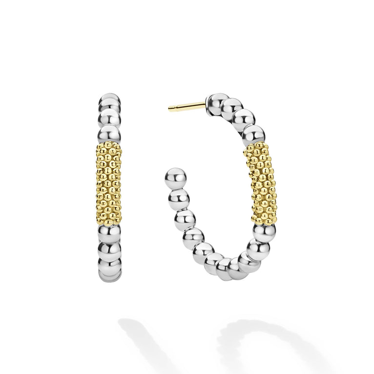 Sterling silver hoops with gold beaded accents.