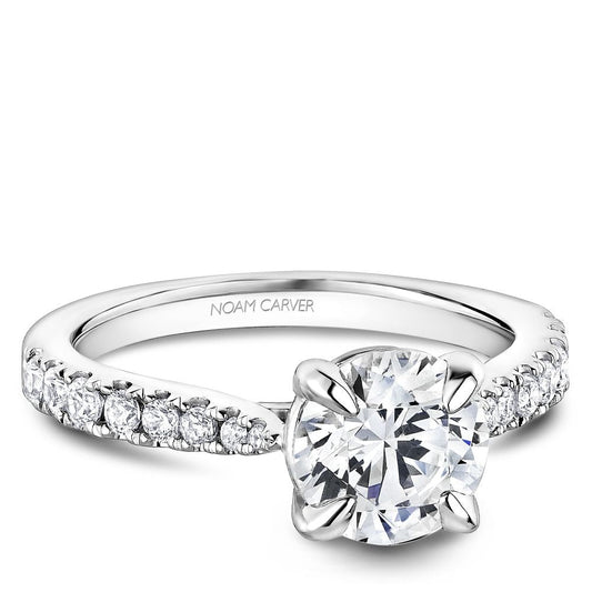 Platinum ring with round side diamonds.