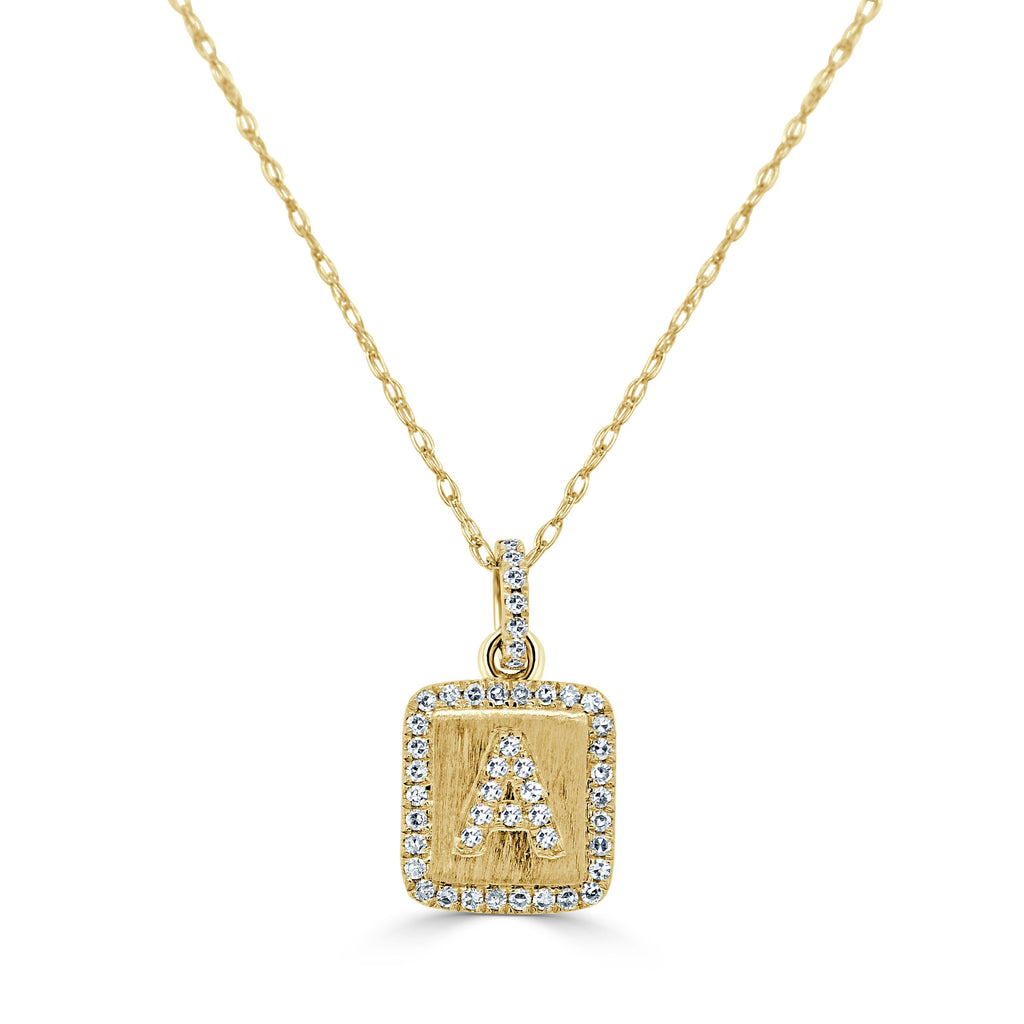Gold necklace with diamond-accented initial pendant.