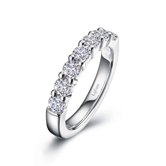 Simulated diamond band, platinum sterling silver, round stones.