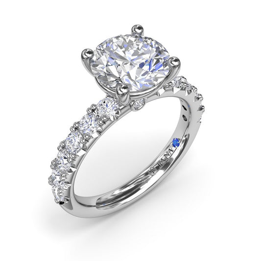 14K white gold ring with emerald diamonds.