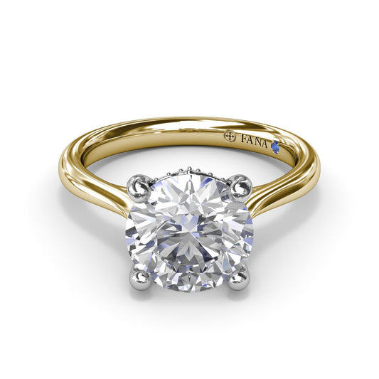 14K yellow gold solitaire diamond ring.