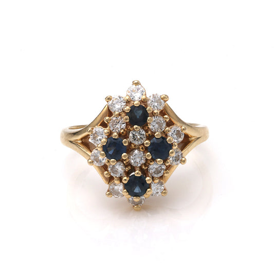 Yellow gold ring with sapphires and diamonds.