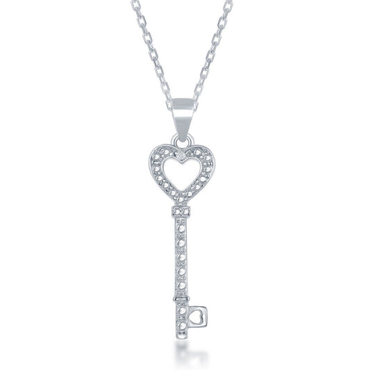 Heart-shaped key pendant with diamond accents.