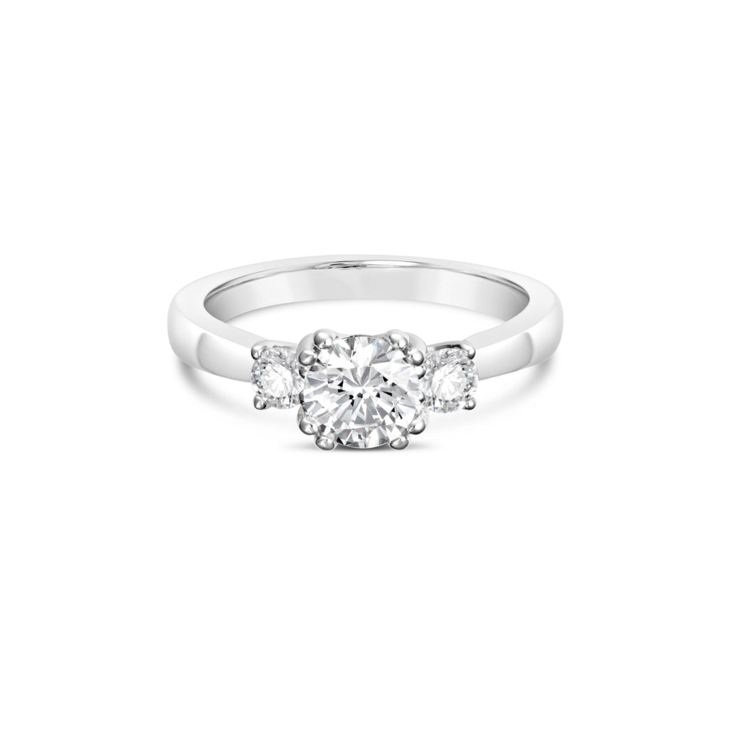 Three-stone diamond ring in white gold.