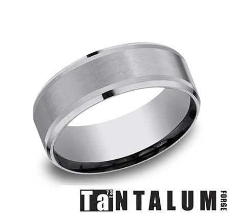 Tantalum grey carved band with polished edges.