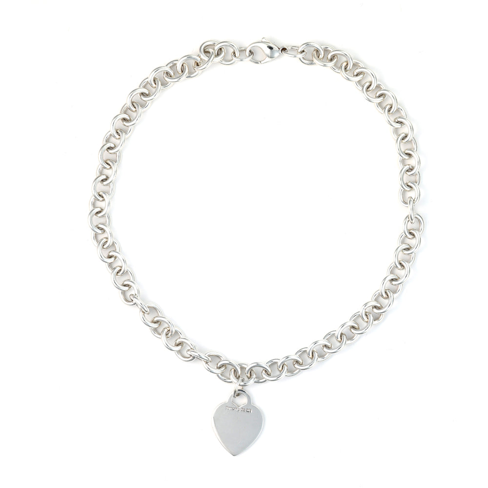 Sterling silver heart pendant necklace.