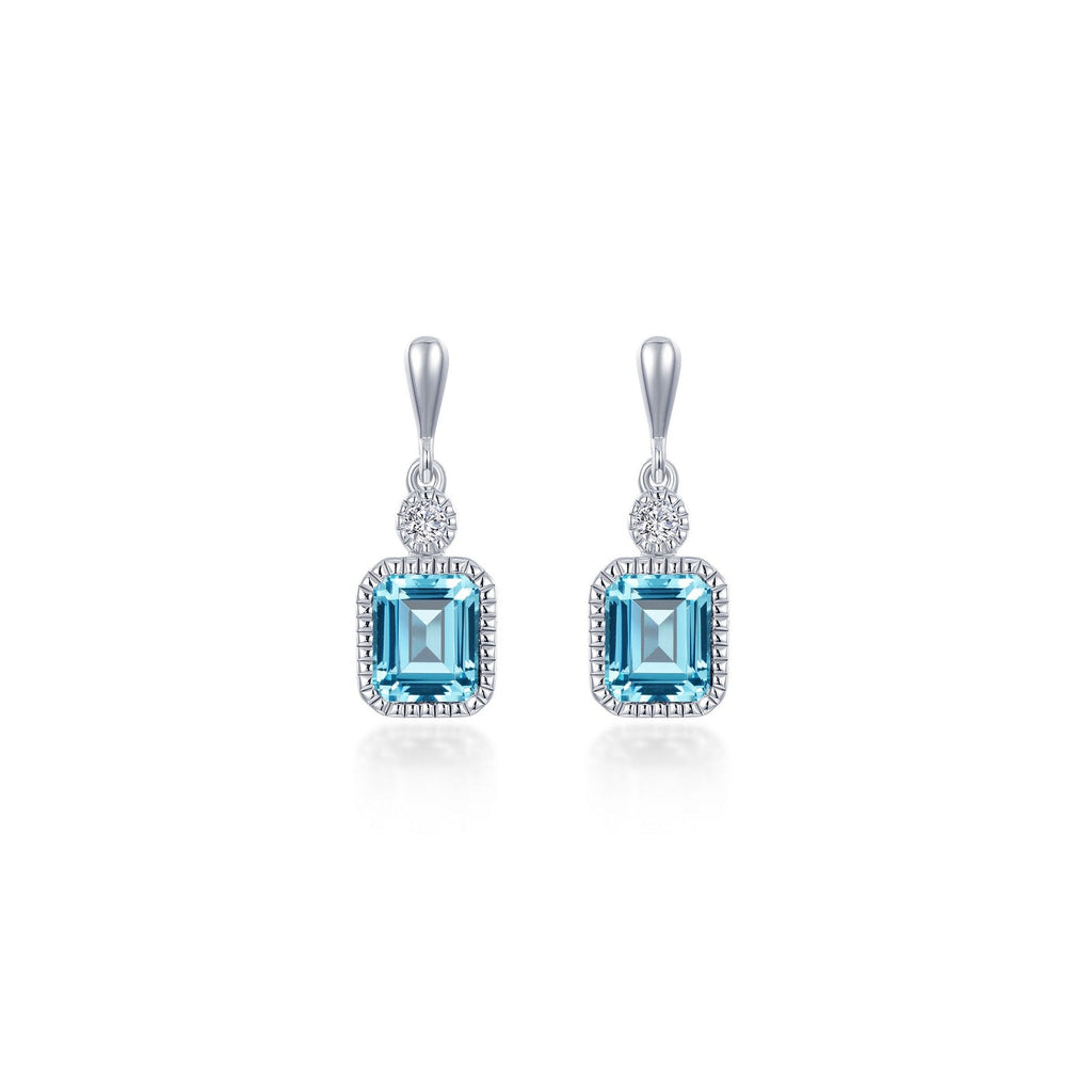 Emerald-cut aquamarine earrings with round diamonds.