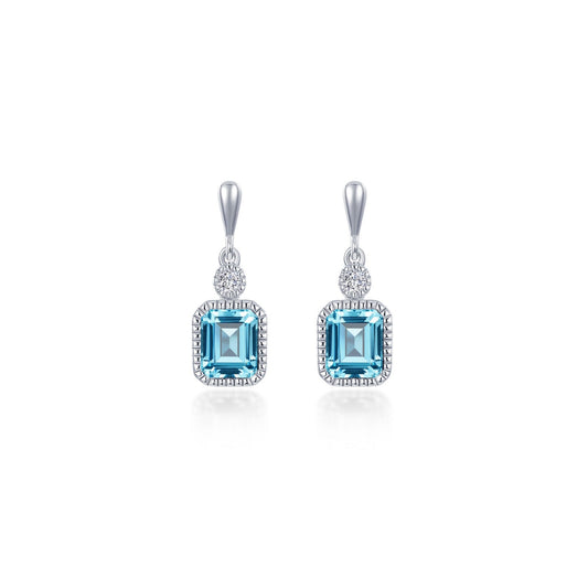 Emerald-cut aquamarine earrings with round diamonds.