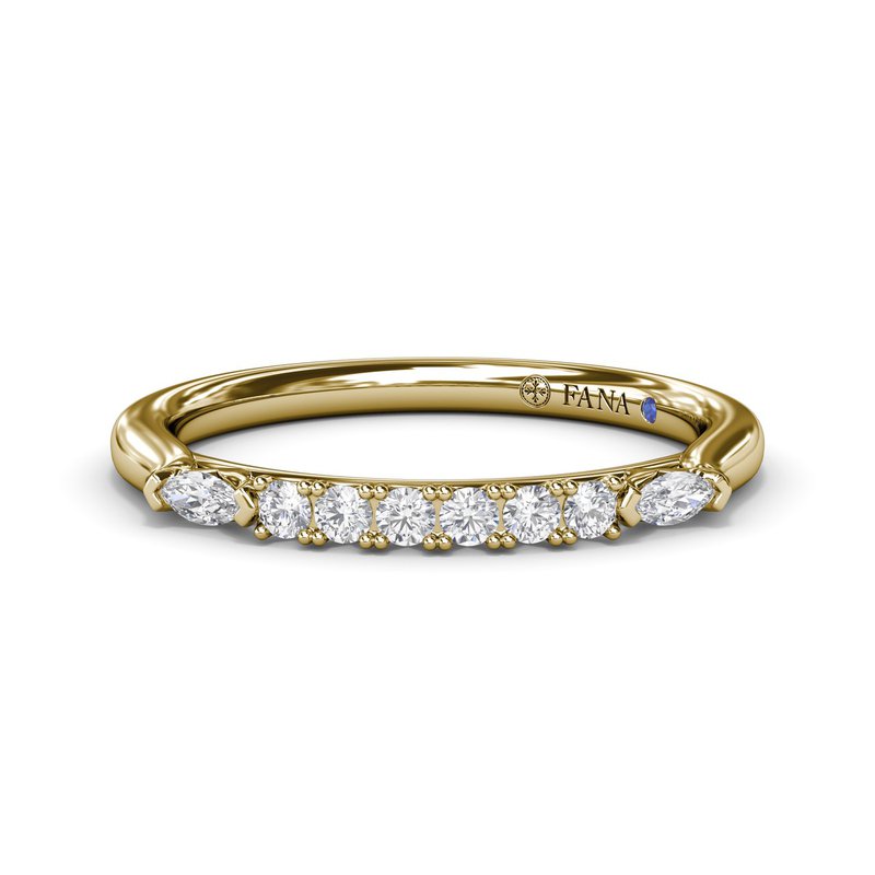 Yellow gold band with various shaped diamonds.