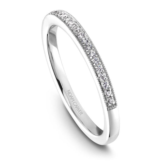 Diamond-studded white gold wedding band.