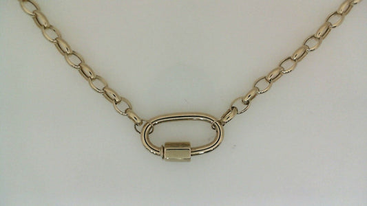Gold chain necklace with oval link centerpiece.