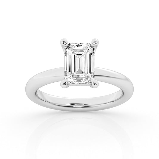 Emerald-cut diamond ring in white gold.