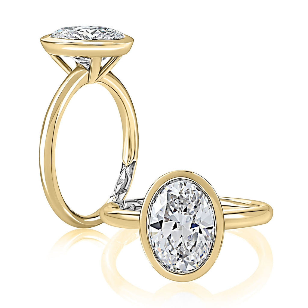 Solitaire diamond ring, yellow gold band.