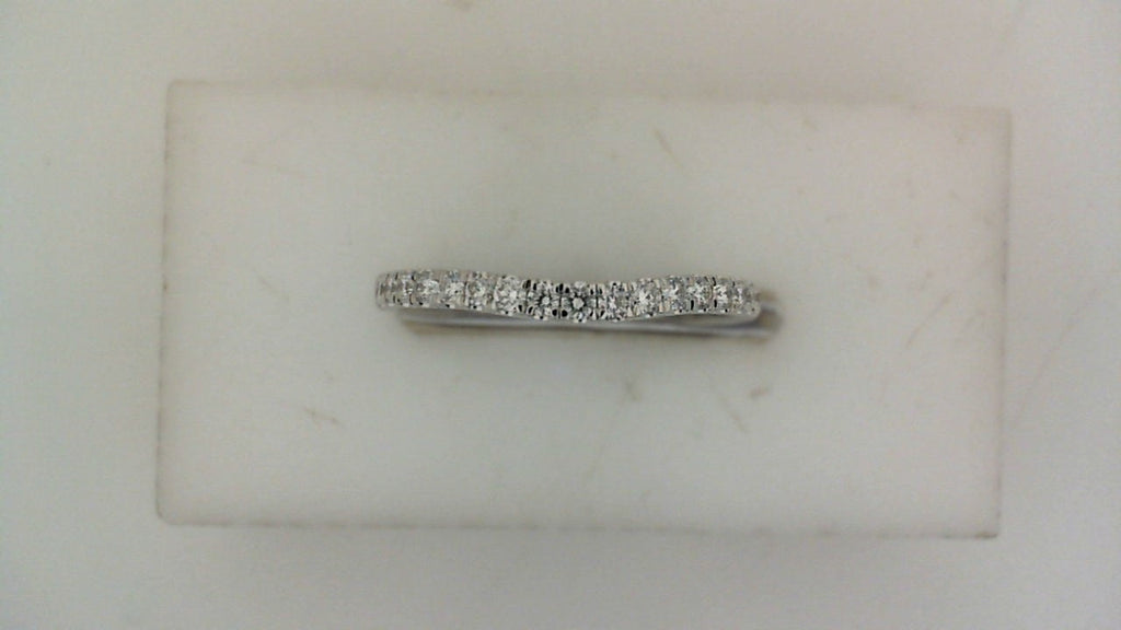 Contour wedding band with round diamonds.