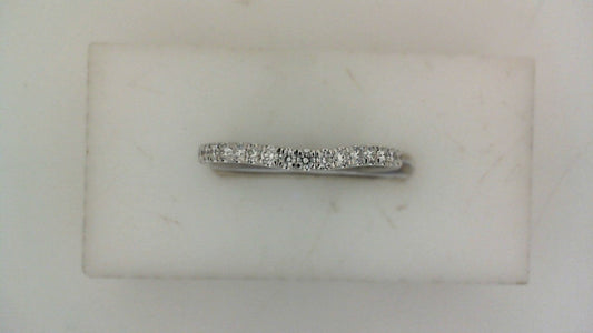 Contour wedding band with round diamonds.