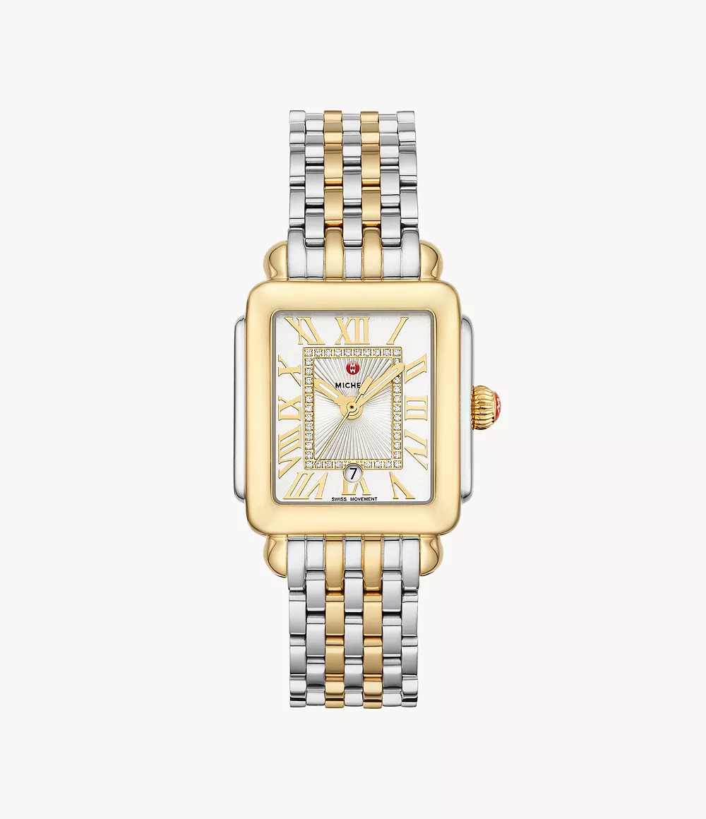 Gold and silver watch with diamond accents.