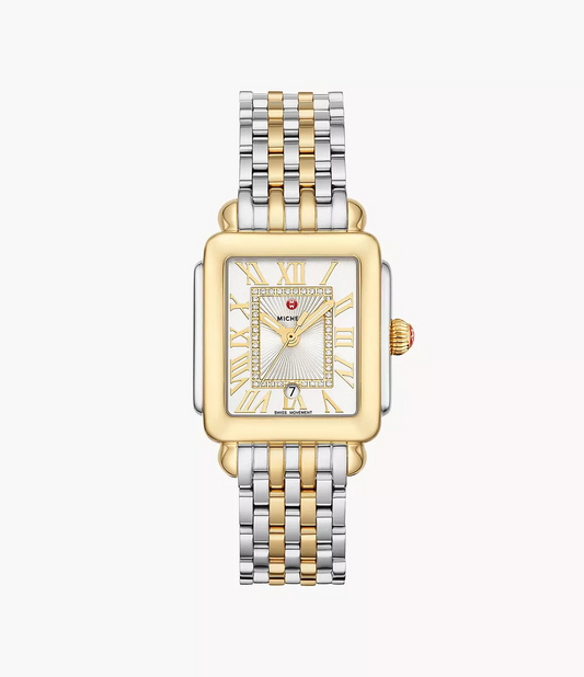 Gold and silver watch with diamond accents.