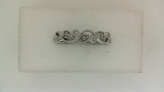 14K white gold band with intricate diamond design.