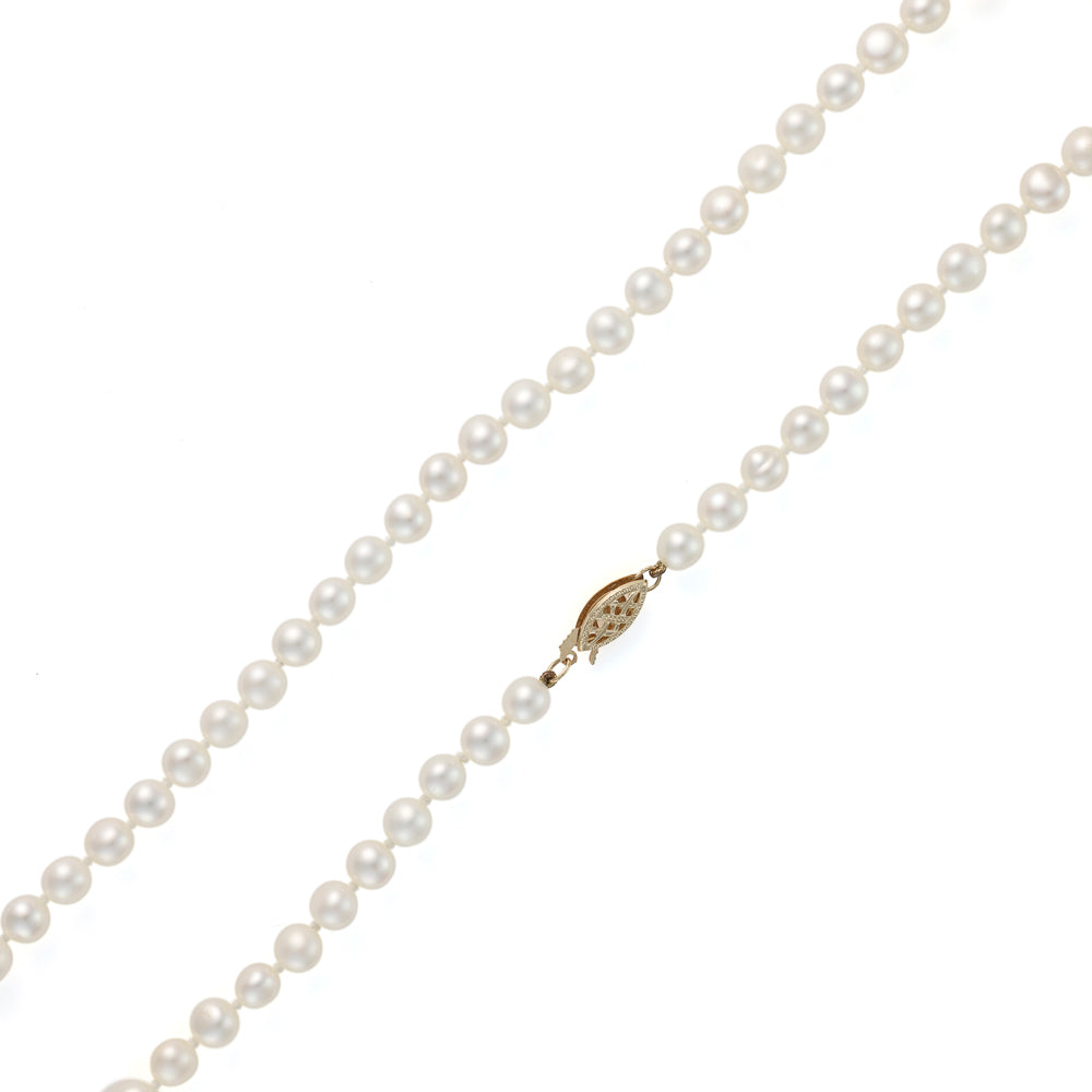 Pearl strand necklace with gold plunger clasp.