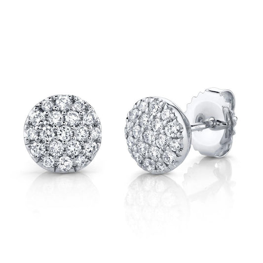 Round diamond cluster earrings in white gold.