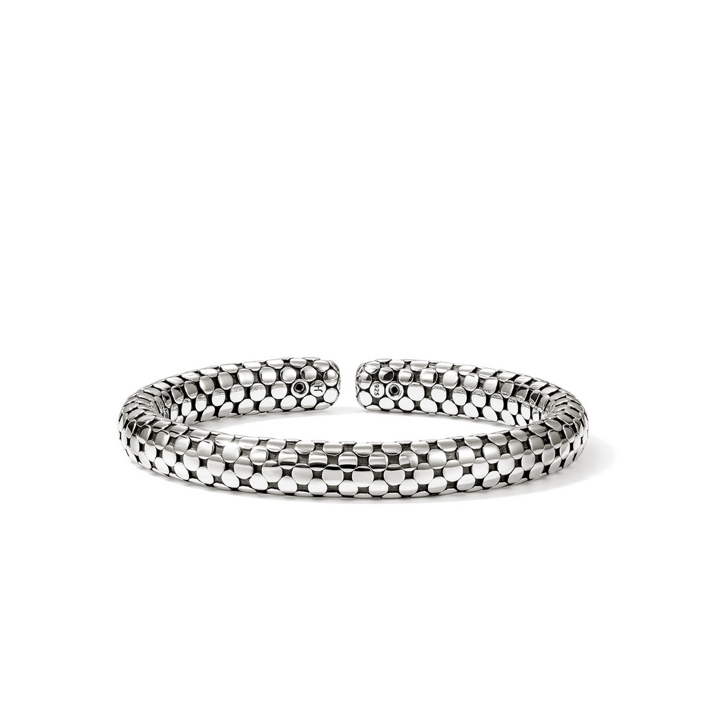 Sterling silver cuff bracelet with hexagonal pattern.
