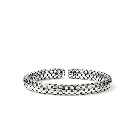 Sterling silver cuff bracelet with hexagonal pattern.