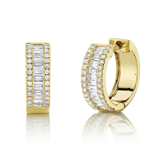 Gold huggie earrings with diamond accents.