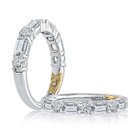14K white gold band with emerald diamonds.