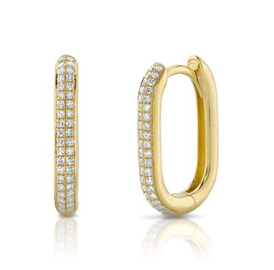 14K yellow gold diamond hoop earrings.