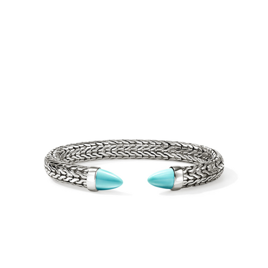 Sterling silver bracelet with turquoise gemstones.