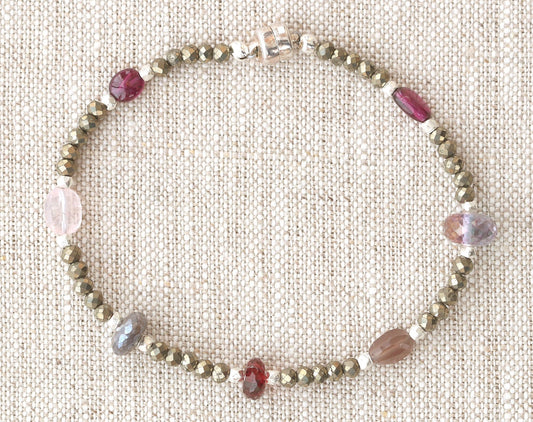 Garnet bracelet with pyrite and silver beads.