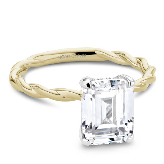 Twisted gold band with solitaire setting.