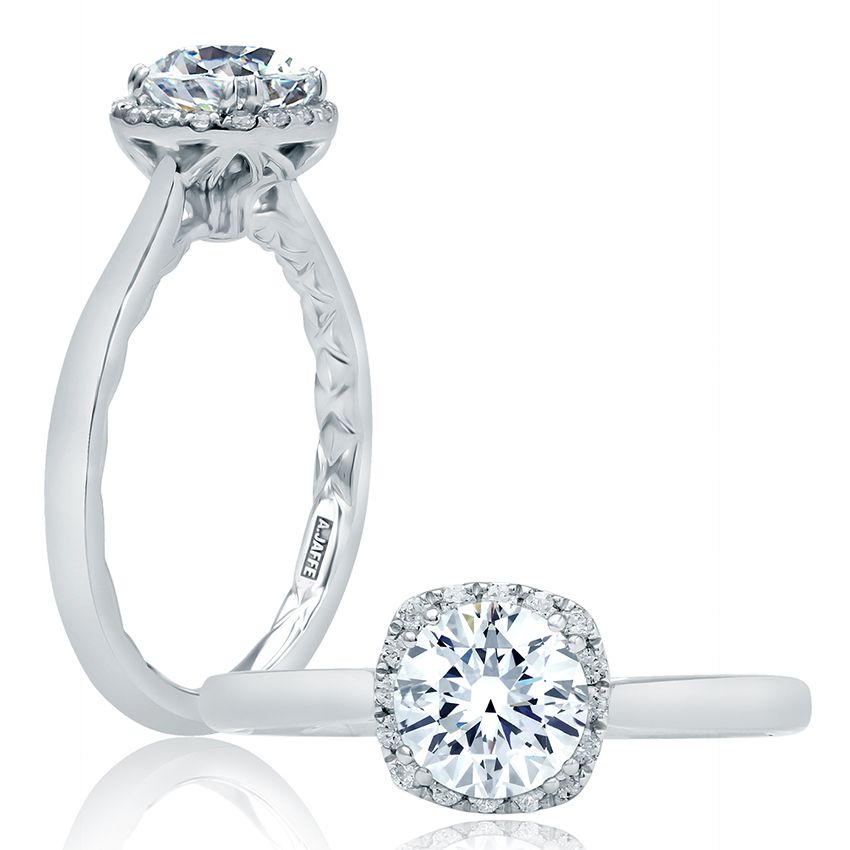 14K white gold diamond halo ring.